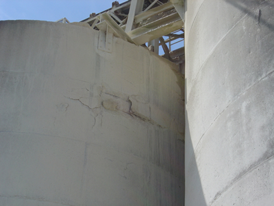 Failure of Poured Silo Wall From One Layer of Reinforcing