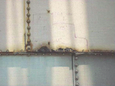Holes in bolted steel silo due to corrosion