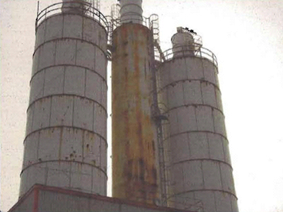 Steel silos need painting. Painting delayed due to high cost.